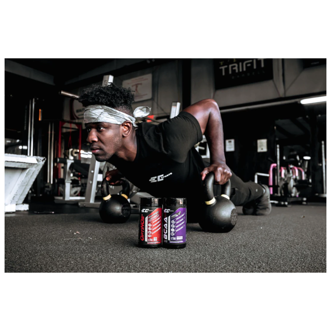 Picture of athlete working out with EC sports bcaa in forefront of picture